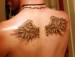 Fake_Wings_Tattoo_by_Timoteus.jpg